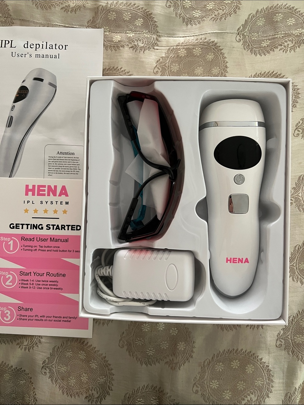 HENA White Handheld Laser Hair Removal Device in original box